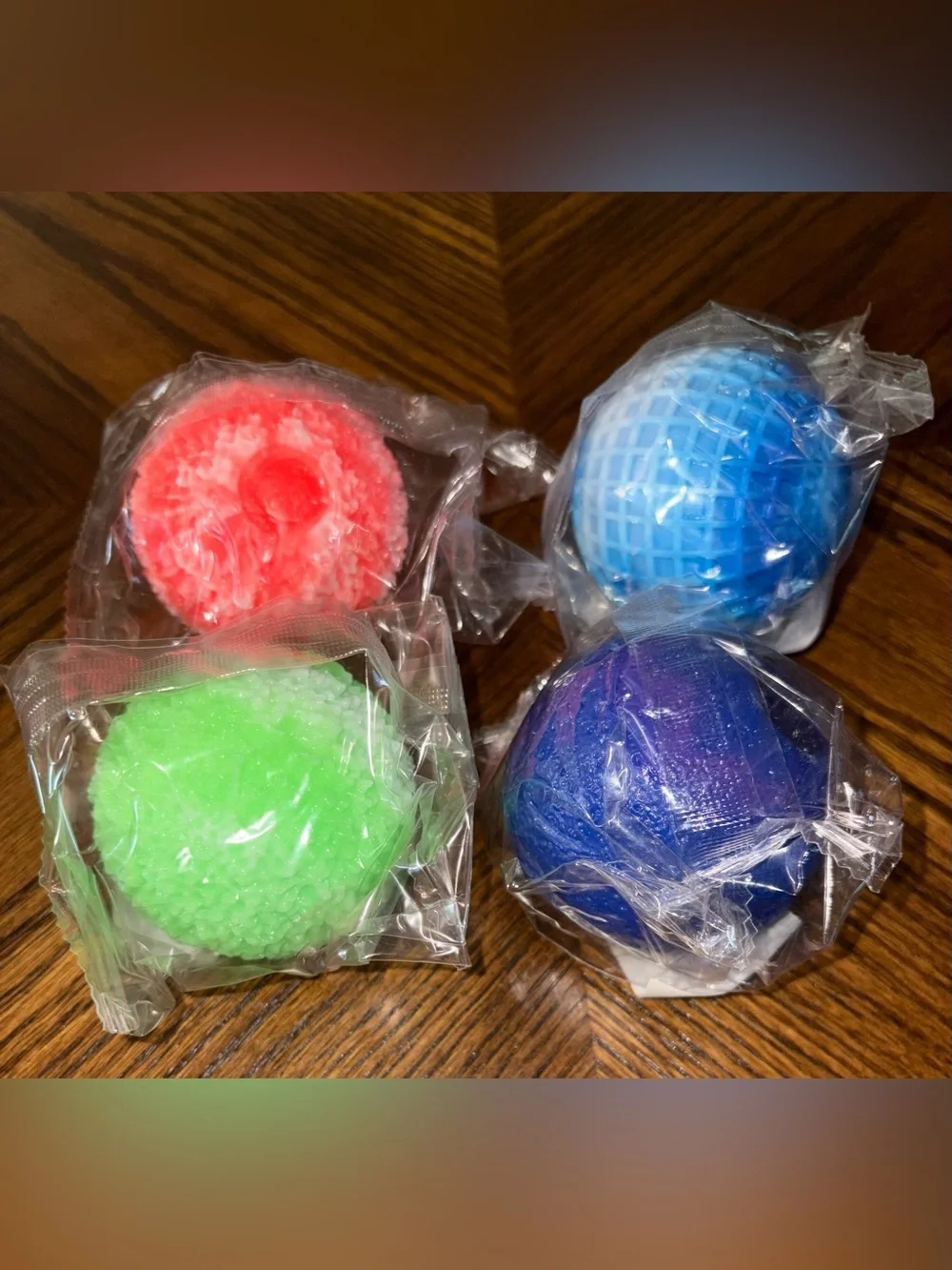 Lot of 4 Various Textured Squish Balls - NEW